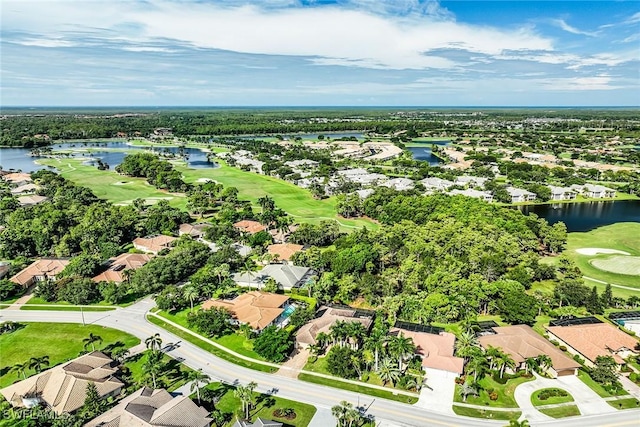 bird's eye view featuring a residential view, view of golf course, and a water view