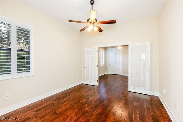 unfurnished bedroom with ceiling fan, wood-type flooring, and french doors