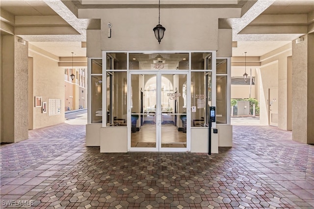 property entrance featuring french doors