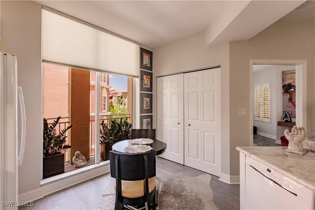 sitting room with tile patterned floors