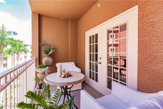 balcony featuring french doors