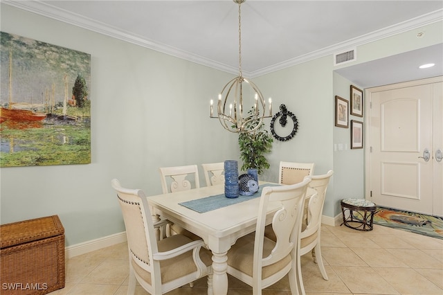 tiled dining room featuring ornamental molding and an inviting chandelier