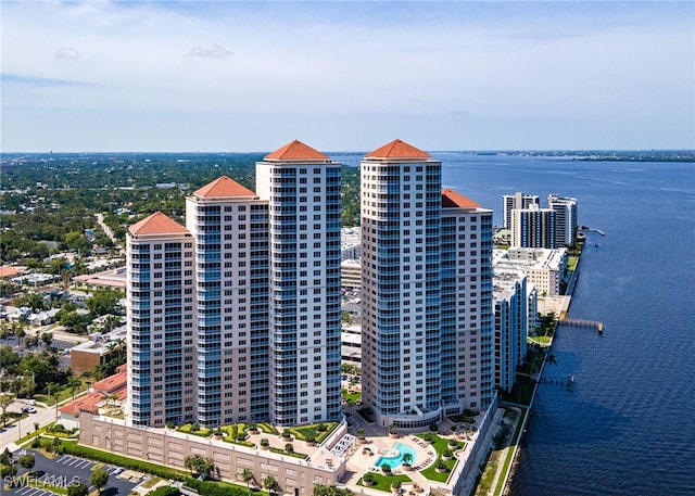 birds eye view of property with a water view