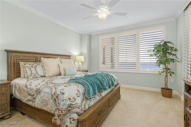 bedroom featuring ceiling fan, light carpet, and crown molding