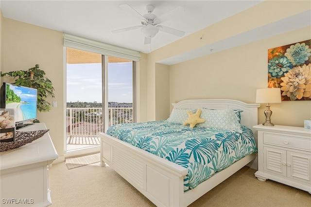 bedroom featuring ceiling fan, light colored carpet, and access to exterior