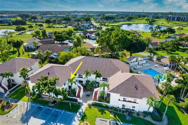 drone / aerial view with a water view