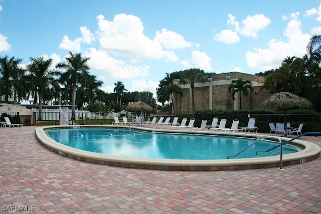 view of swimming pool with a patio