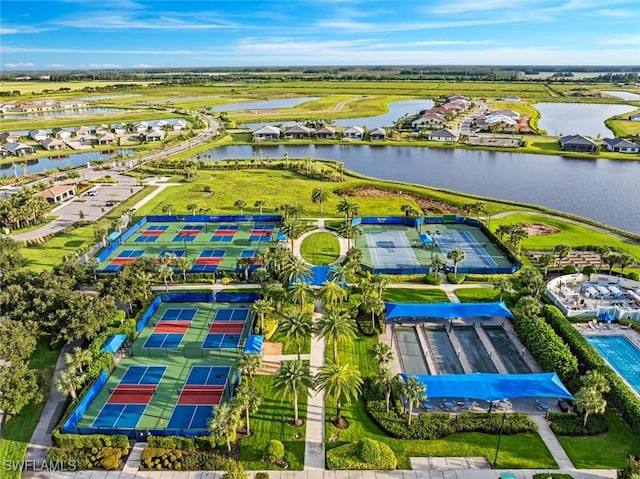 birds eye view of property featuring a water view