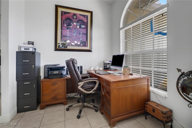 office with light tile patterned flooring