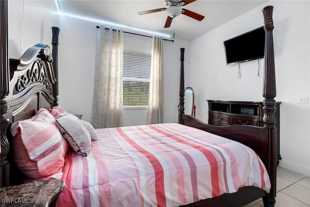 3711 4th Ave SE, Naples, FL 34117 - bedroom with tile patterned flooring, a ceiling fan, and baseboards