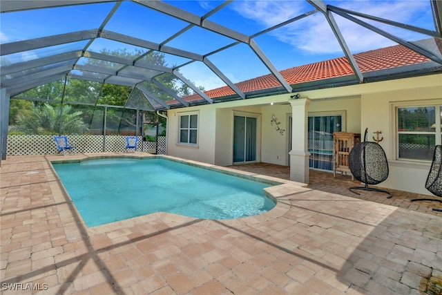 3711 4th Ave SE, Naples, FL 34117 - outdoor pool with a patio and glass enclosure