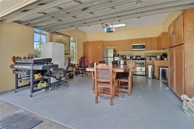 3711 4th Ave SE, Naples, FL 34117 - dining space with finished concrete floors