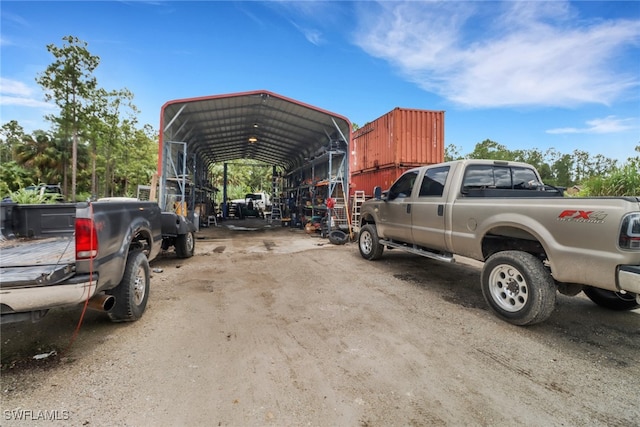 view of parking featuring a carport