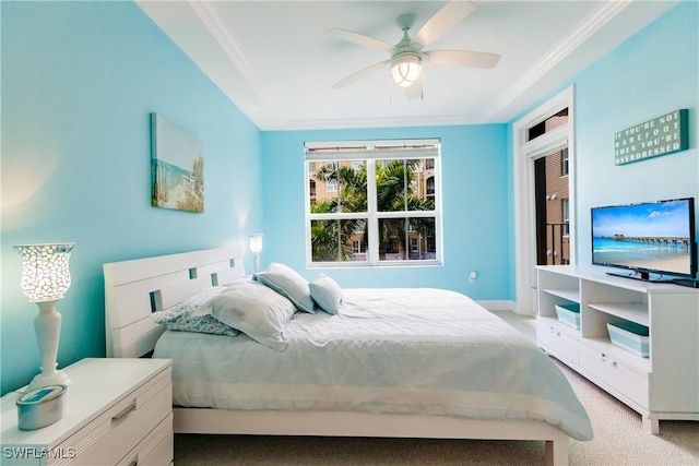 bedroom with ceiling fan, crown molding, and light carpet