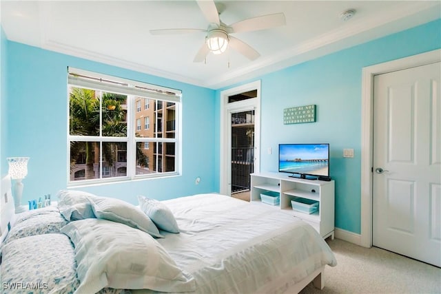 bedroom featuring ceiling fan, light colored carpet, and ornamental molding