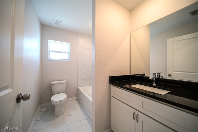 full bathroom featuring toilet, tile patterned floors, vanity, and bathing tub / shower combination