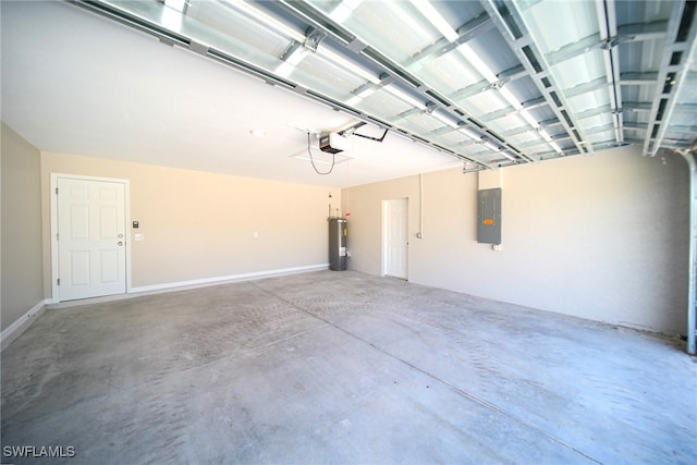 garage with a garage door opener, electric water heater, and electric panel