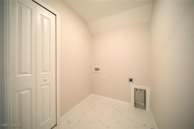 laundry area with electric dryer hookup, light tile patterned floors, and washer hookup