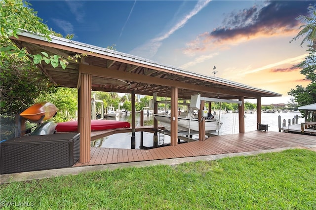 dock area featuring a water view