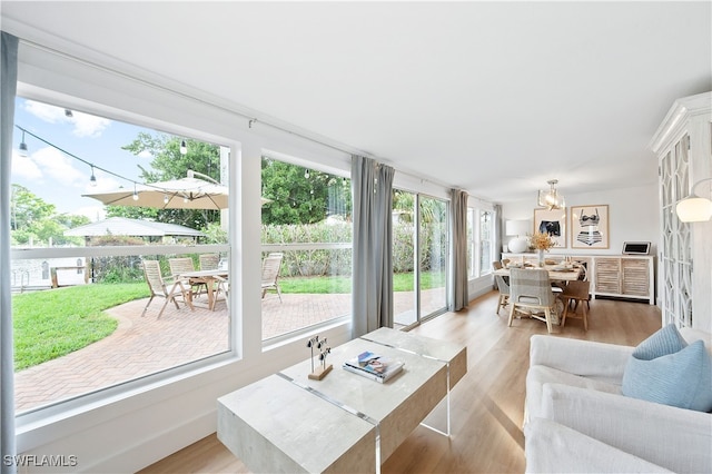 living room with light hardwood / wood-style flooring