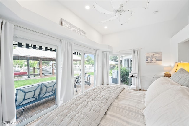 bedroom featuring ceiling fan and access to outside