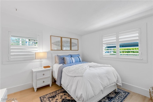 bedroom featuring light hardwood / wood-style floors