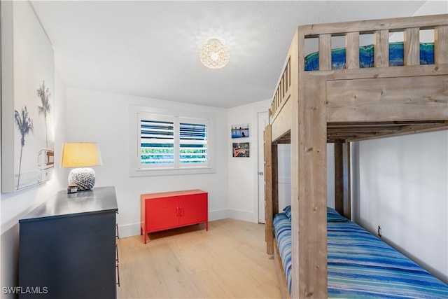 bedroom with light hardwood / wood-style floors