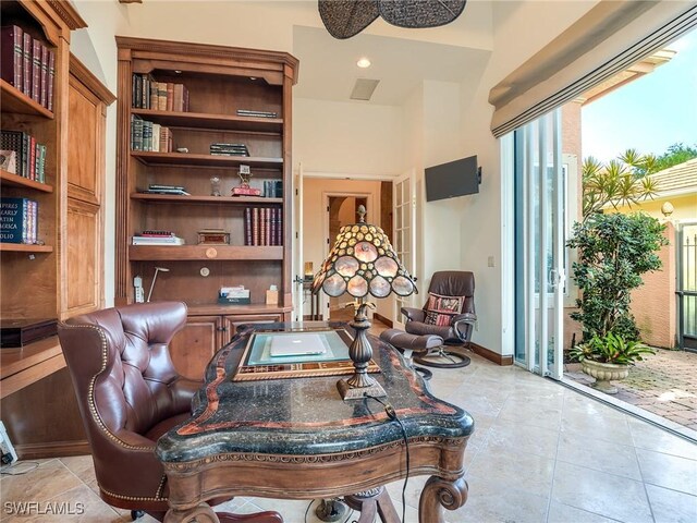 sitting room with light tile patterned flooring