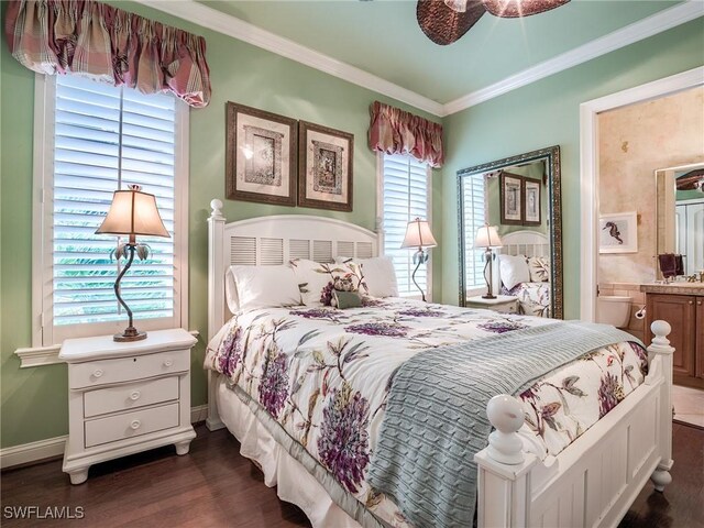 bedroom with ensuite bath, ornamental molding, and dark hardwood / wood-style floors