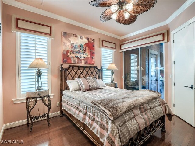 bedroom featuring multiple windows, crown molding, dark hardwood / wood-style floors, and ceiling fan