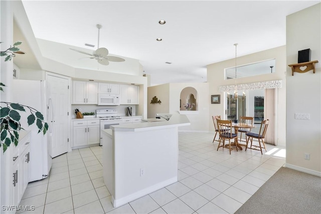 kitchen featuring white appliances, light tile patterned floors, ceiling fan, light countertops, and white cabinetry