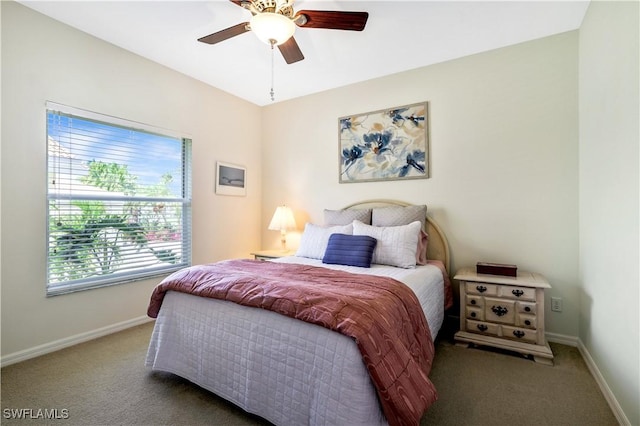 bedroom featuring carpet floors, baseboards, and a ceiling fan