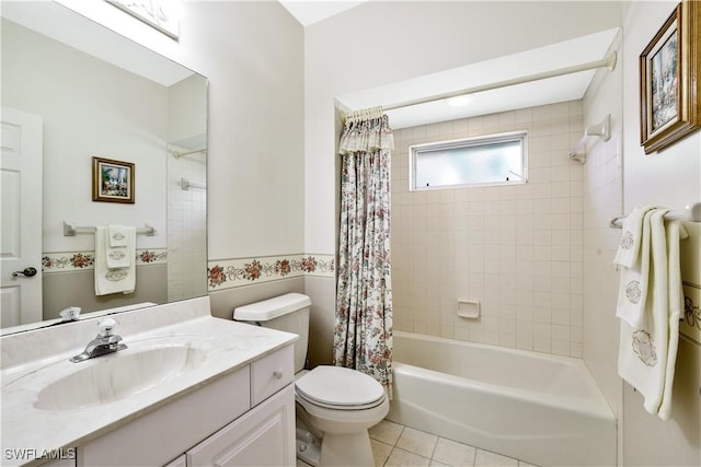 bathroom with toilet, tile patterned flooring, shower / bath combo with shower curtain, and vanity