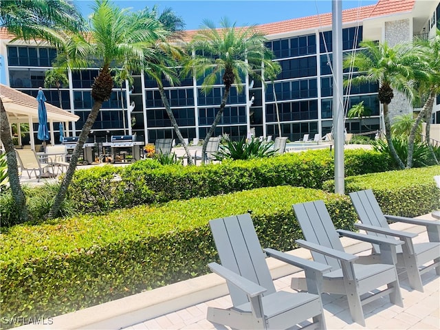 222 Harbour Dr Unit 114, Naples, FL 34103 - exterior space with a patio