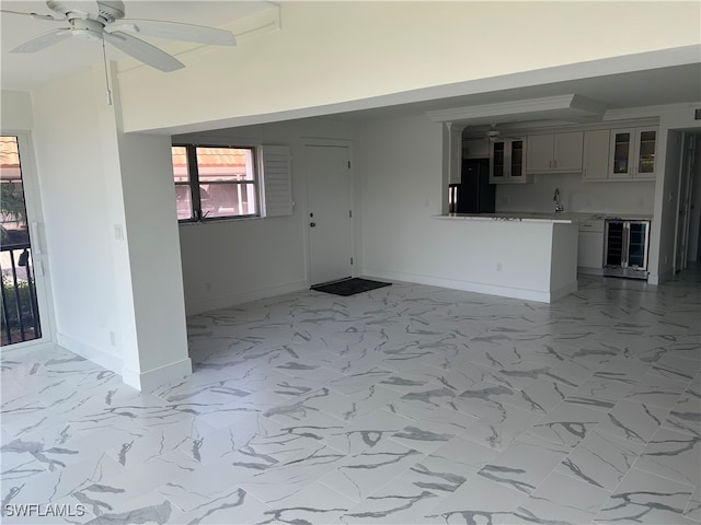 222 Harbour Dr Unit 114, Naples, FL 34103 - interior space with beverage cooler, ceiling fan, and sink