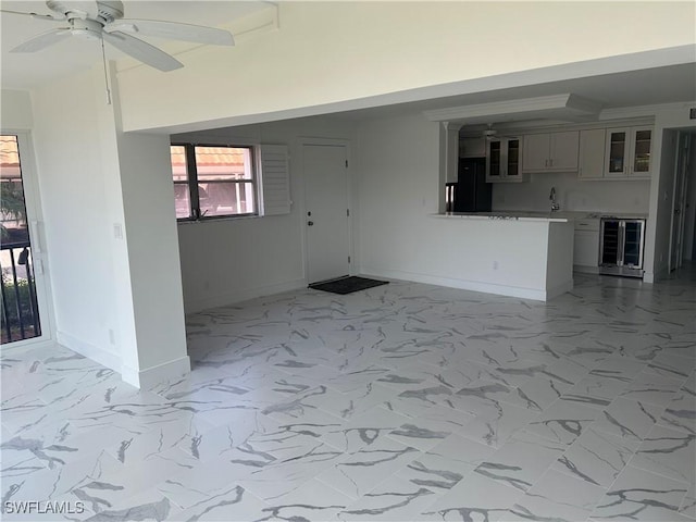 222 Harbour Dr Unit 114, Naples, FL 34103 - unfurnished living room with ceiling fan and light marble finish flooring