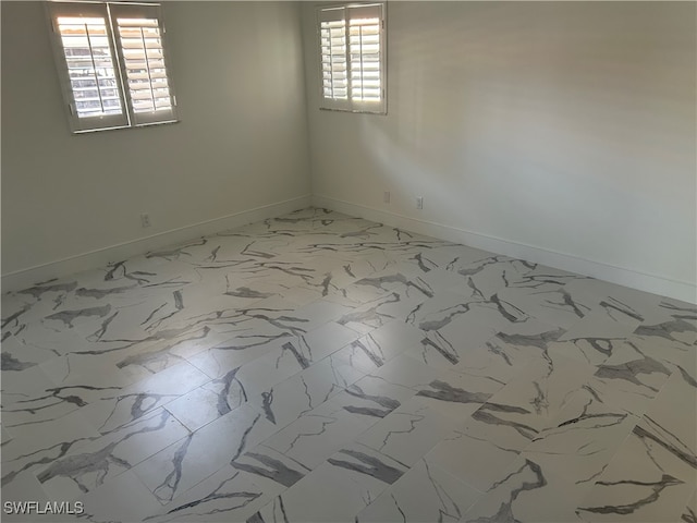 222 Harbour Dr Unit 114, Naples, FL 34103 - unfurnished room with a wealth of natural light