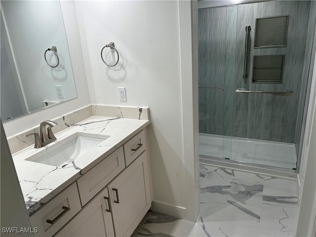222 Harbour Dr Unit 114, Naples, FL 34103 - bathroom with marble look tile flooring, vanity, and a shower stall
