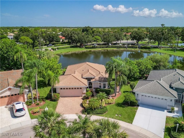 birds eye view of property featuring a water view