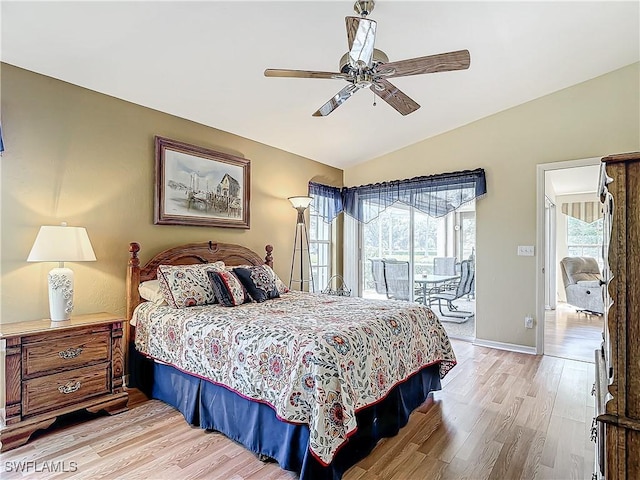 bedroom featuring baseboards, lofted ceiling, ceiling fan, access to outside, and light wood-style floors