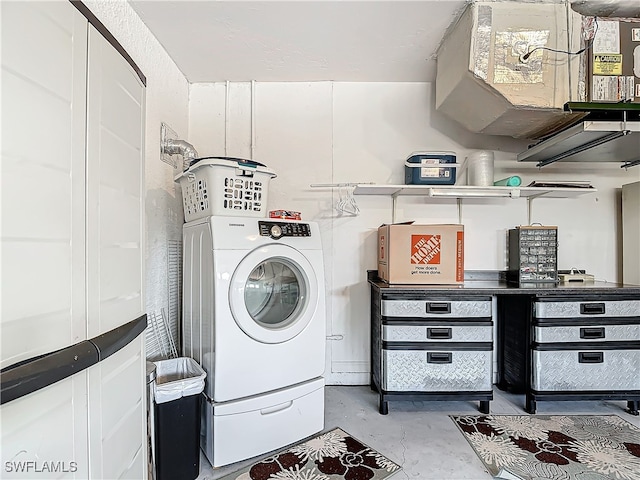 laundry room featuring washer / dryer