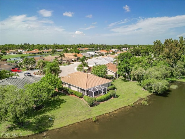 aerial view with a water view and a residential view