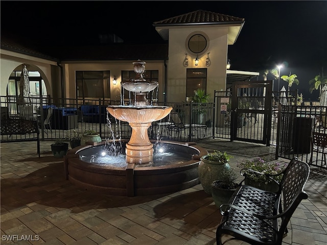 view of patio at night