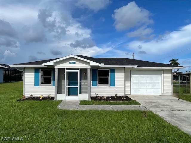 single story home featuring a garage and a front lawn