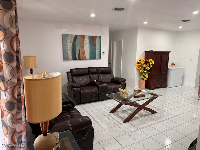 living room with light tile patterned floors