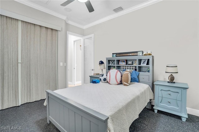 bedroom with ceiling fan, visible vents, baseboards, and ornamental molding