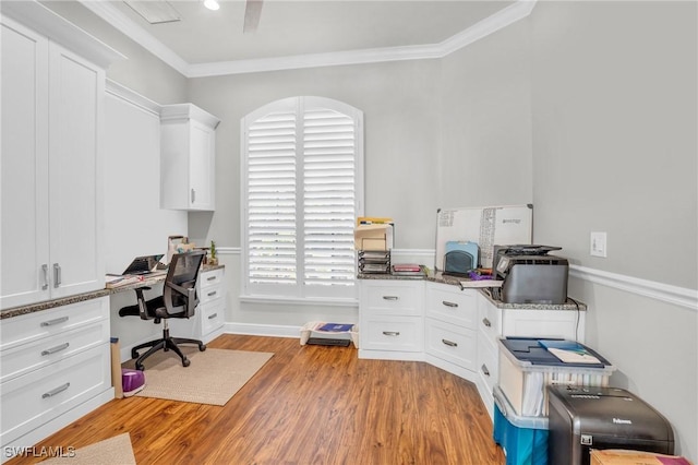 home office with light wood-style floors and crown molding