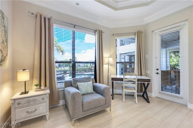 sitting room featuring ornamental molding