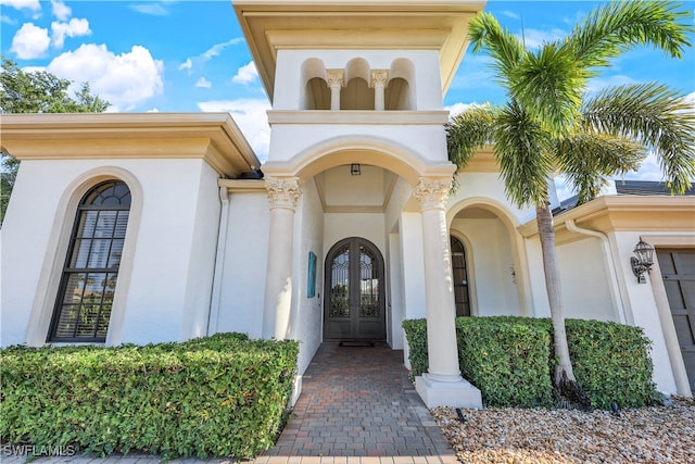 property entrance featuring french doors