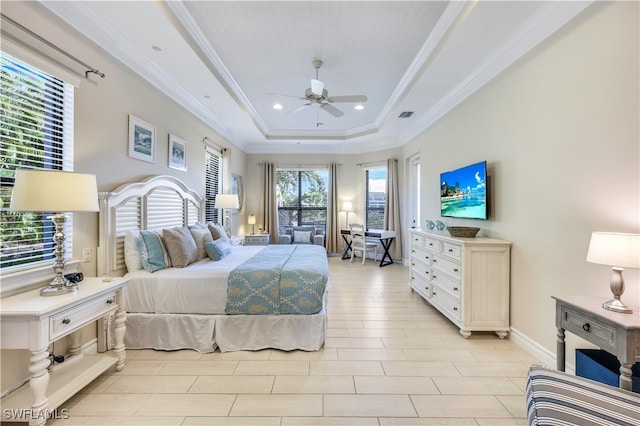 bedroom featuring ceiling fan, light tile patterned flooring, a raised ceiling, and ornamental molding